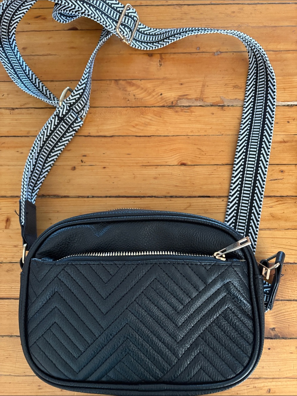 Black Quilted Crossbody Bag with Patterned Strap